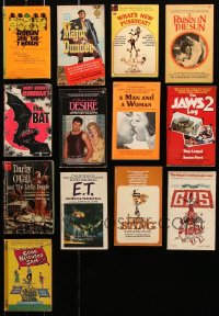 9d016 LOT OF 13 MOVIE EDITION PAPERBACK BOOKS 1940s-1980s The Bat, Jaws 2, The Sting & more!