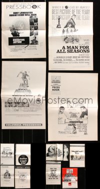 9d106 LOT OF 12 UNCUT PRESSBOOKS 1960s-1970s advertising for a variety of different movies!