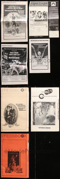 9d117 LOT OF 7 CUT PRESSBOOKS 1960s-1980s advertising for a variety of different movies!