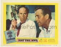9k255 BEAT THE DEVIL LC #7 1953 great c/u of wide-eyed Robert Morley looking at Humphrey Bogart!