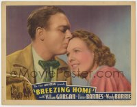 9k286 BREEZING HOME LC 1937 close up of William Gargan kissing Wendy Barrie on the forehead!