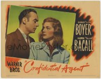 9k336 CONFIDENTIAL AGENT LC 1945 best close up of Charles Boyer staring at sexy Lauren Bacall!