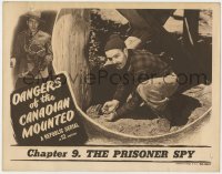 9k358 DANGERS OF THE CANADIAN MOUNTED chapter 9 LC 1948 The Prisoner Spy, bad guy with dynamite!