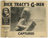 9k384 DICK TRACY'S G-MEN chapter 2 LC R1955 close up of guy in deep sea diving suit, Captured!