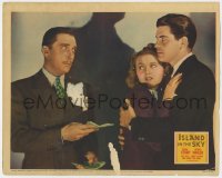 9k541 ISLAND IN THE SKY LC 1938 Michael Whalen holds Gloria Stuart as Leon Ames hands him cash!