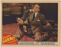 9k580 LAUGHING AT DANGER LC 1940 close up of Frankie Darro on ground struggling with bad guy!