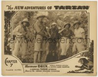 9k677 NEW ADVENTURES OF TARZAN chapter 7 LC 1935 4 men & a woman in jungle drawing back in fear!