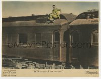 9k687 NOW OR NEVER LC 1921 Harold Lloyd on top of moving train is happy he got an upper berth!