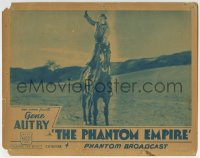 9k720 PHANTOM EMPIRE chapter 4 LC 1935 Phantom Broadcast, Betsy King Ross standing while on horse!