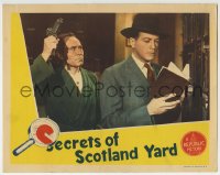 9k810 SECRETS OF SCOTLAND YARD LC 1944 close up of Edgar Barrier about to get pistol-whipped!