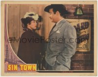 9k839 SIN TOWN LC 1942 close up of Broderick Crawford looking down at pretty Anne Gwynne!