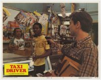 9k879 TAXI DRIVER LC #6 1976 great image of Robert De Niro with gun drawn in convenience store!