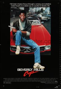 9r493 BEVERLY HILLS COP 1sh 1984 great image of detective Eddie Murphy sitting on red Mercedes!