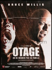 9t704 HOSTAGE French 1p 2005 super close image of Bruce Willis holding gun in the rain!