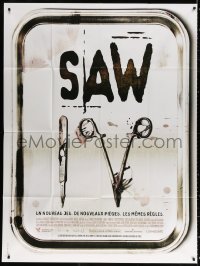 9t887 SAW IV French 1p 2007 different image of bloody surgical tools on tray, horror sequel!