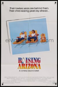 9w719 RAISING ARIZONA 1sh 1987 Coen Brothers, best art of Nicolas Cage, Holly Hunter & baby!