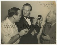 9y175 DAVID NIVEN signed deluxe 10.75x13.5 still 1940s showing camera light meter to crew members!
