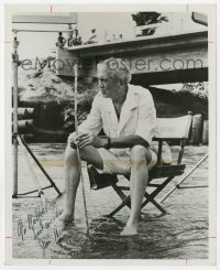 9y522 JOHN HUSTON signed 8x10 TV still 1964 candid portrait on chair in the middle of a stream!