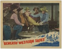 1a285 BENEATH WESTERN SKIES LC 1944 western cowboy Bob Livingston punches bad guy in the face!