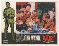 1a511 HATARI LC #6 R1967 Howard Hawks, John Wayne in Africa at table with sexy Elsa Martinelli!