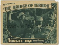1a580 JUNGLE JIM chapter 5 LC 1936 man in cave about to bushwhack native man, The Bridge of Terror!