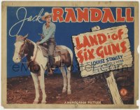 1a085 LAND OF SIX GUNS TC 1940 great image of western cowboy Jack Randall on horseback and sign!