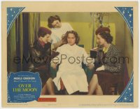 1a718 OVER THE MOON LC 1939 close up of Merle Oberon sitting in chair having her hair done!