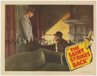 1a807 SAINT STRIKES BACK LC 1939 detective George Sanders confronts crook kneeling on floor!
