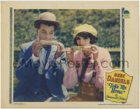 1a887 TAKE ME HOME LC 1928 close up of Bebe Daniels & Neil Hamilton eating corn on the cob!