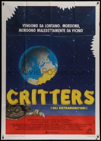 1f036 CRITTERS Italian 1p 1986 different Fuga art of monster & bite taken out of the Earth!