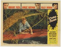 1k271 CAPE FEAR LC #4 1962 close up of Robert Mitchum in rowboat in swamp, classic film noir!