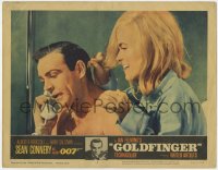 1k432 GOLDFINGER LC #2 1964 c/u of sexy Shirley Eaton behind Sean Connery as James Bond on phone!