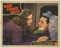 1k475 HERE COMES KELLY LC 1943 c/u of Joan Woodbury taking care of sick Eddie Quillan in bed!