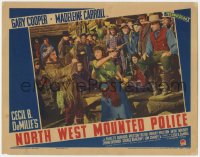 1k677 NORTH WEST MOUNTED POLICE LC 1940 crowd watches angry Paulette Goddard attack Scotsman!