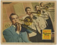 1k690 ORCHESTRA WIVES LC 1942 wonderful image of Glenn Miller playing trombone with his band!