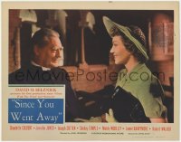 1k822 SINCE YOU WENT AWAY LC 1944 close up of Claudette Colbert smiling at priest Lionel Barrymore!