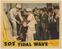 1k778 S.O.S. TIDAL WAVE LC 1939 reporters watch paramedics put young girl into ambulance!
