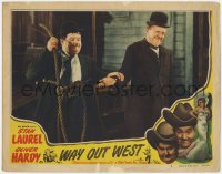 1k948 WAY OUT WEST LC #3 R1947 angry Oliver Hardy about to whack Stan Laurel on hand with rope!