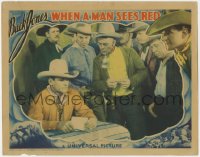 1k959 WHEN A MAN SEES RED LC 1934 many cowboys gather around Buck Jones with pencil & paper!
