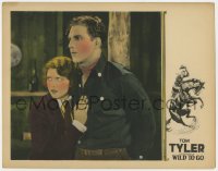 1k978 WILD TO GO LC 1926 c/u of scared Eugenia Gilbert staying close to cowboy Tom Tyler, rare!