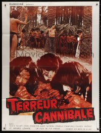 1s613 CANNIBAL TERROR French 1p 1980 gruesome image of natives feeding on human flesh!