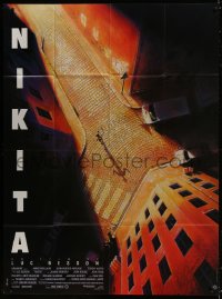 1s782 LA FEMME NIKITA French 1p 1990 Luc Besson, cool overhead art of Anne Parillaud in alley!