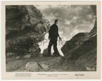 1t368 FRANKENSTEIN 8x10.25 still R1951 Boris Karloff as the monster walking by giant rock!