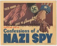 2c204 CONFESSIONS OF A NAZI SPY LC 1939 art of Uncle Sam's hand grabbing Nazi hand, ultra rare!