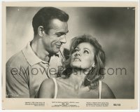 2h291 DR. NO 8x10 still R1965 c/u of Sean Connery as James Bond smiling down at Ursula Andress!