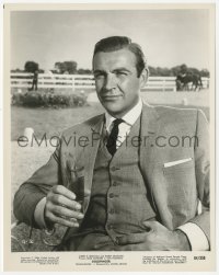 2h386 GOLDFINGER 8x10.25 still 1964 great portrait of Sean Connery as James Bond having a drink!
