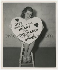 2h488 JANIS PAIGE 8.25x10 still 1940s sexy actress holding sign to promote The March of Dimes!