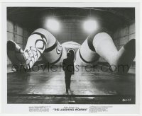2h558 LAUGHING WOMAN 8.25x10 still 1969 man approaching enormous female statue in hangar, Metzger!