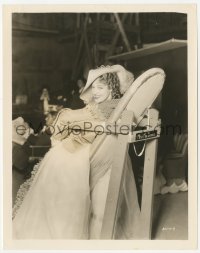 2h675 NAUGHTY MARIETTA candid 8x10 still 1935 Jeanette MacDonald on leaning board between scenes!
