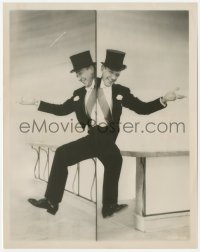 2h818 SILK STOCKINGS 8x10.25 still 1957 cool mirror image of happy Fred Astaire wearing top hat!